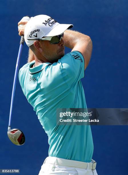 Henrik Stenson of Sweden hits a tee shot on the 10th hole during the third round of the Wyndham Championship at Sedgefield Country Club on August 19,...