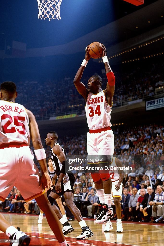 1995 Rockets Final Hakeem Olajuwon of the Houston Rockets grabs the rebound in Game Six ...