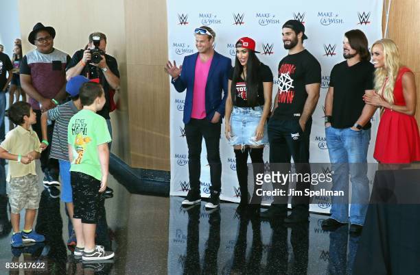 Dolph Ziggler, Nikki Bella, Seth Rollins, A.J. Styles and Dana Warrior surprise wish kids at the WWE Superstars Surprise Make-A-Wish Families at One...