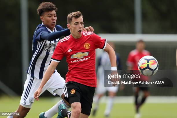 Morgan Rodgers of West Bromwich Albion and Lee O'Connor of Manchester United during the U18 Premier League match between West Bromwich Albion and...