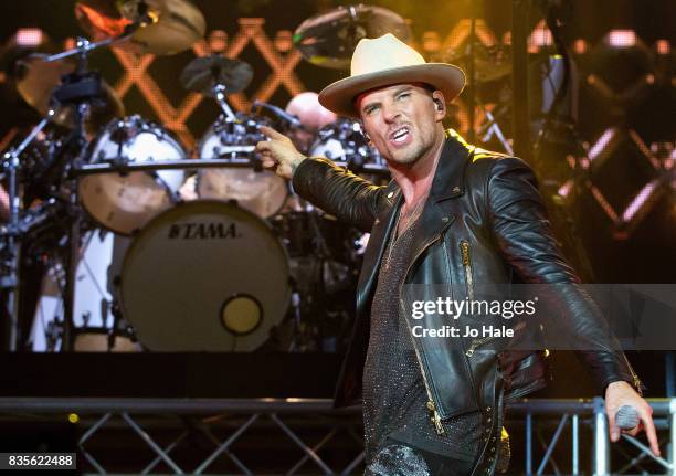 Luke Goss and Matt Goss of Bros perform at The O2 Arena on August 19, 2017 in London, England.