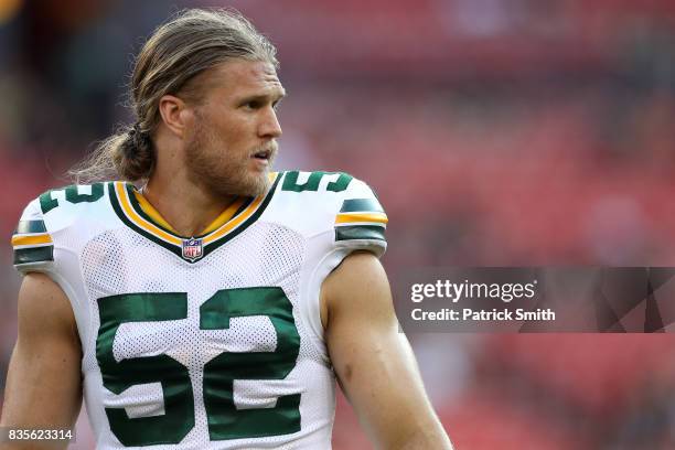 Outside linebacker Clay Matthews of the Green Bay Packers looks on in warmups before playing the Washington Redskins during a preseason game at...