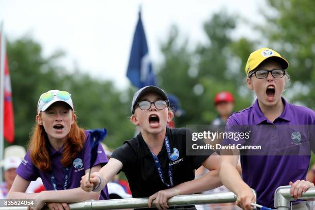 Young Scottish golfers from 'Project 19' Carmen Griffiths, Eilidh Henderson, and Hannah Darling cheer on the European Team during the morning...