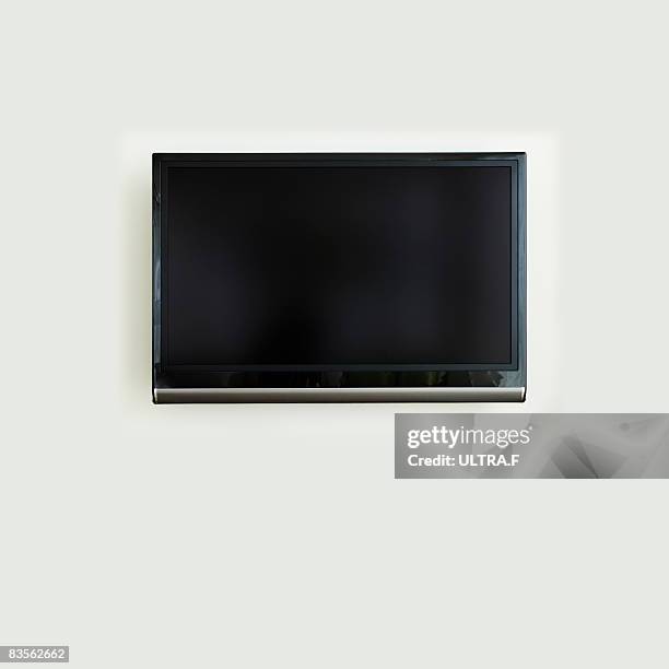 lcd tv - tv on wall stock pictures, royalty-free photos & images