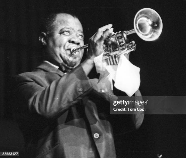 Jazz trumpeter Louis Armstrong performs at the University of Michigan on September 2, 1967 in Ann Arbor, Michigan.