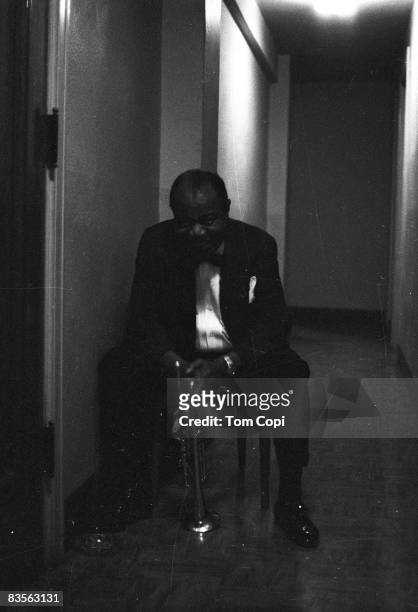 Jazz trumpeter Louis Armstrong backstage at the University of Michigan on September 2, 1967 in Ann Arbor, Michigan.