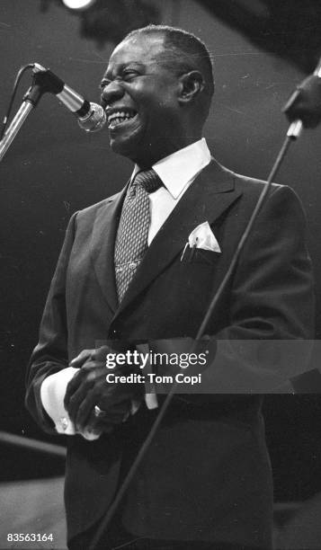 Jazz trumpeter Louis Armstrong performs at the Newport Jazz Festival On July 10, 1970 at Festival Field in Newport, Rhode Island.