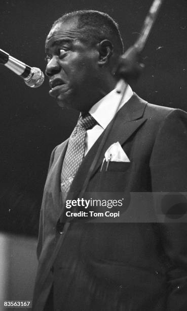 Jazz trumpeter Louis Armstrong performs at the Newport Jazz Festival On July 10, 1970 at Festival Field in Newport, Rhode Island.