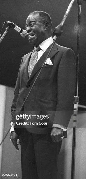 Jazz trumpeter Louis Armstrong performs at the Newport Jazz Festival On July 10, 1970 at Festival Field in Newport, Rhode Island.