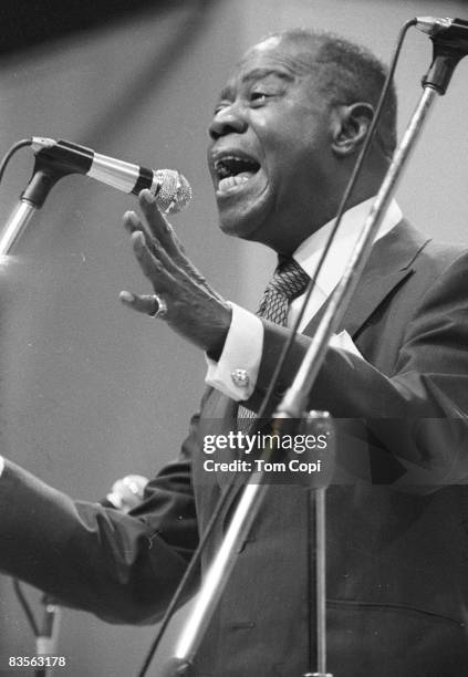 Jazz trumpeter Louis Armstrong performs at the Newport Jazz Festival On July 10, 1970 at Festival Field in Newport, Rhode Island.