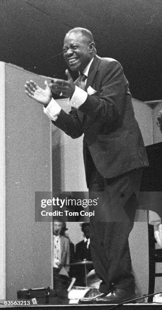 Jazz trumpeter Louis Armstrong performs at the Newport Jazz Festival On July 10, 1970 at Festival Field in Newport, Rhode Island.