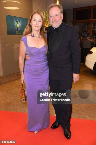 Harold Faltermeyer and his girlfriend Birgit Wolff attend the GRK Golf Charity Masters evening gala on August 19, 2017 in Leipzig, Germany.