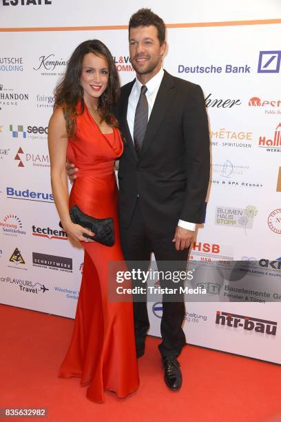 Michael Ballack and Natacha Tannous attend the GRK Golf Charity Masters evening gala on August 19, 2017 in Leipzig, Germany.