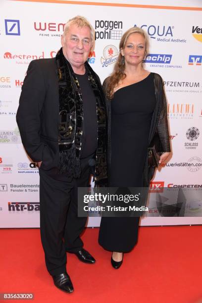 Heinz Hoenig and his girlfriend Gabriele Gabi Lechner attend the GRK Golf Charity Masters evening gala on August 19, 2017 in Leipzig, Germany.