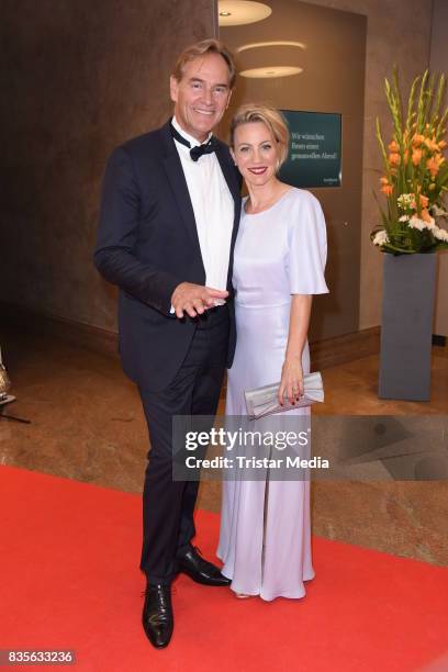 Burkhard Jung and his wife Ayleena Jung attend the GRK Golf Charity Masters evening gala on August 19, 2017 in Leipzig, Germany.