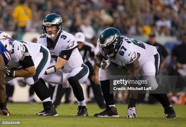 Matt McGloin and Chance Warmack of the Philadelphia Eagles plays against the Buffalo Bills the preseason game at Lincoln Financial Field on August...