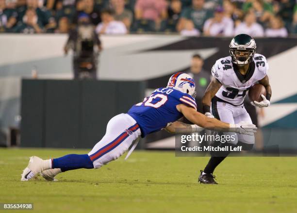Donnel Pumphrey of the Philadelphia Eagles runs the ball against Tanner Vallejo of the Buffalo Bills in the preseason game at Lincoln Financial Field...