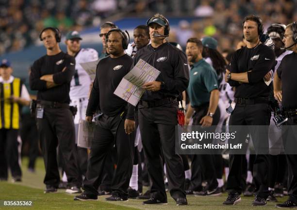 Head coach Doug Pederson and running backs coach Duce Staley of the Philadelphia Eagles look on against the Buffalo Bills in the preseason game at...