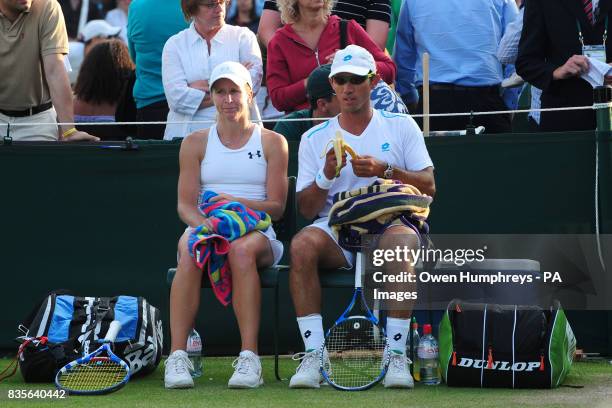 South Africa's Jeff Coetzee and USA's Jill Craybas in mixed doubles action against Netherland Antilles' Jean-Julien Rojer and Kazakhstan's Galina...