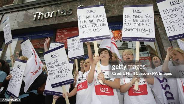 Thomas Cook staff hold a demonstration outside the Grafton Street store in Dublin over the company's plans to close high street operations.