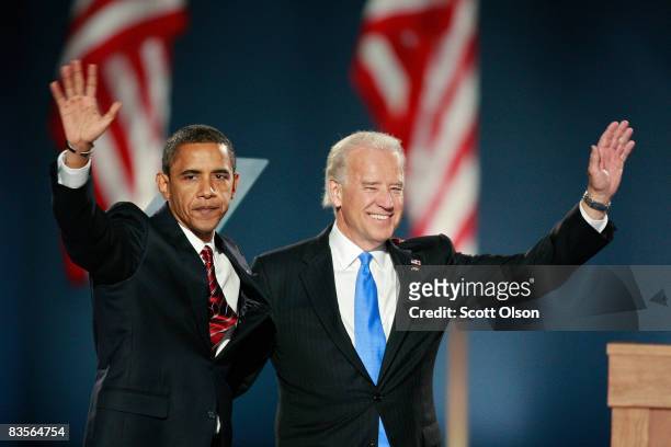 President elect Barack Obama and Vice-President elect Joe Biden wave to their supporters after Obama gave his victory speech during an election night...