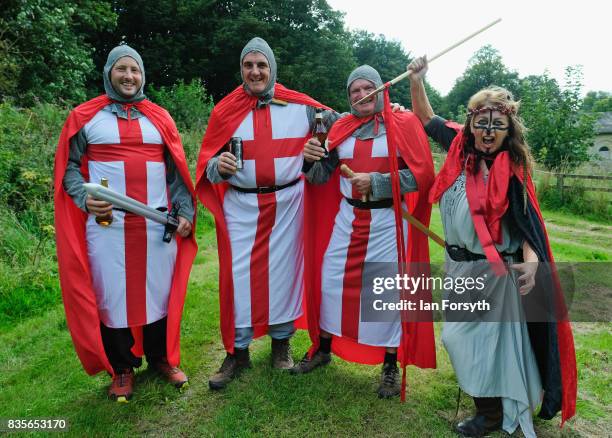 Grop of freinds from Middlesbrough dress as knights as they attend the annual Castle Howard Proms Spectacular concert held on the grounds of the...