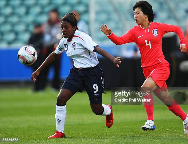 Danielle Carter of England is tackled by Hye Jin Oh of South Korea during the FIFA U-17 Women's World Cup match between the England and South Korea...