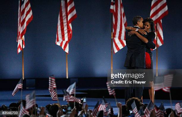 President elect Barack Obama embraces his wife Michelle after Obama gave his victory speech during an election night gathering in Grant Park on...
