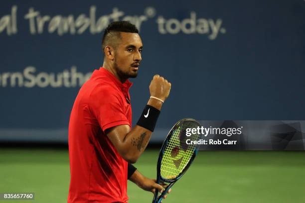 Nick Kyrgios of Australia celebrates winning a point against David Ferrer of Spain during Day 8 of the Western and Southern Open at the Linder Family...