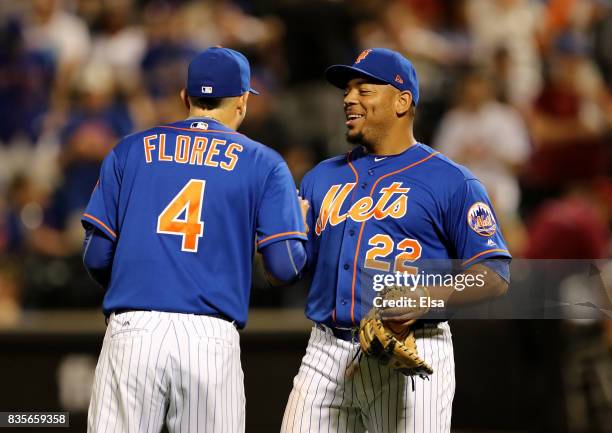 Wilmer Flores and Dominic Smith of the New York Mets celebrate the 8-1 win over the Miami Marlins on August 19, 2017 at Citi Field in the Flushing...