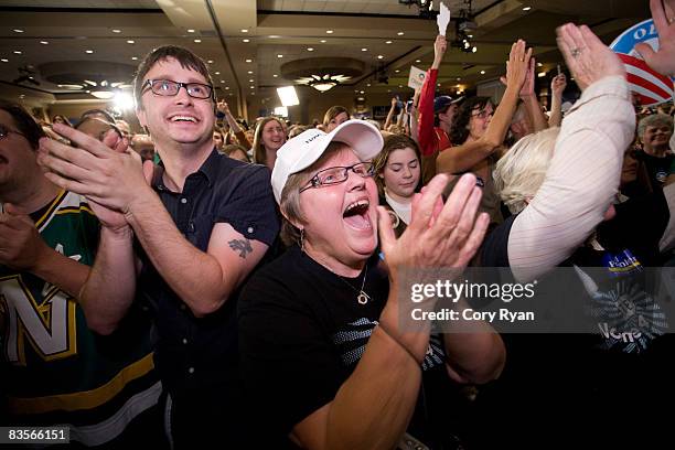 Ginger Hedstrom of St. Paul, Minnesota cheers after the news was announced that Barack Obama is the new U.S. President, during the DFL gathering on...