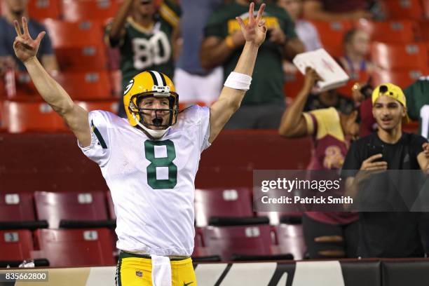 Quarterback Taysom Hill of the Green Bay Packers celebrates after rushing for a touchdown against the Washington Redskins in the fourth quarter...