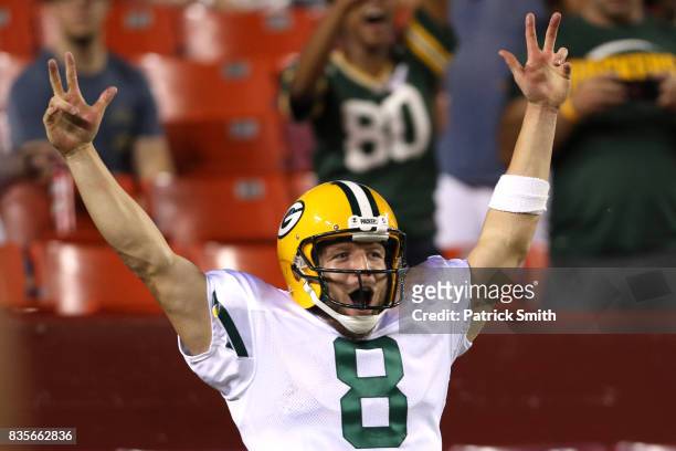 Quarterback Taysom Hill of the Green Bay Packers celebrates after rushing for a touchdown against the Washington Redskins in the fourth quarter...