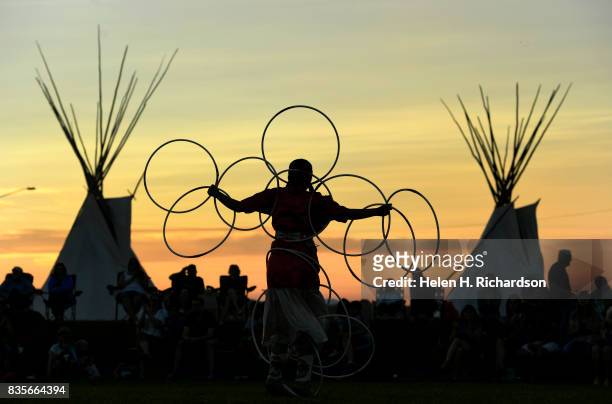 Zariah Whiteplume, a Northern Arapaho, performs an intricate hoop dance as she dances with the Native Strut Hoop Dancers and the Eagle Spirit dancers...