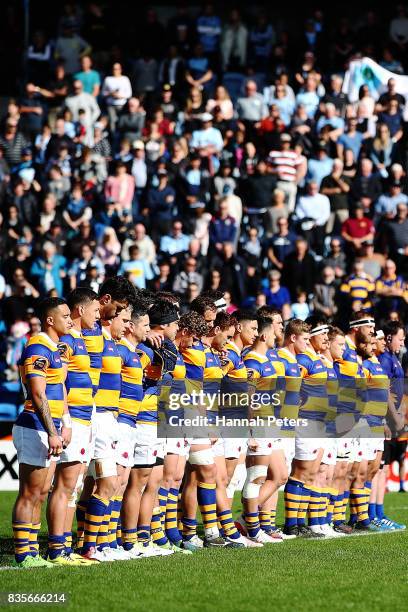 Bay of Plenty stand in silence to acknowledge the passing of Former All Blacks player, Sir Colin Meads during the round one Mite 10 Cup match between...