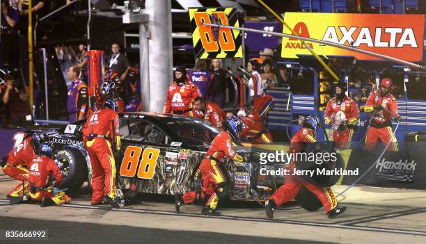 Dale Earnhardt Jr., driver of the AXALTA/Ducks Unlimited Chevrolet, pits during the Monster Energy NASCAR Cup Series Bass Pro Shops NRA Night Race at...