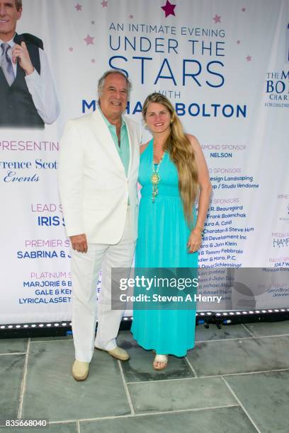 Steart Lane and Bonnie Comley attend An Intimate Evening Under The Stars With Michael Bolton at Private Residence on August 19, 2017 in...