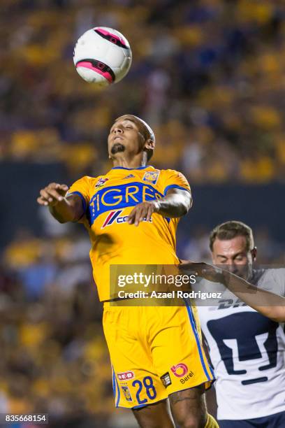 Luis Rodriguez of Tigres heads the ball during the 5th round match between Tigres and Pumas as part of the Torneo Apertura 2017 Liga MX at...