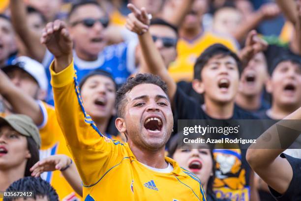 Fans of Tigres cheer their team during the 5th round match between Tigres and Pumas as part of the Torneo Apertura 2017 Liga MX at Universitario...