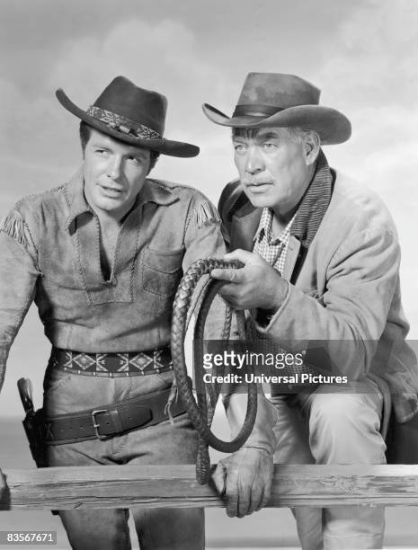 American actors Robert Horton and Ward Bond in a promotional portrait for the television series 'Wagon Train', circa 1959.