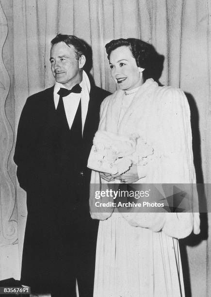 American actors Lew Ayres and Jane Wyman at the pose backstage at the Academy Awards, Los Angeles, California, 24th March 1949. The two were...