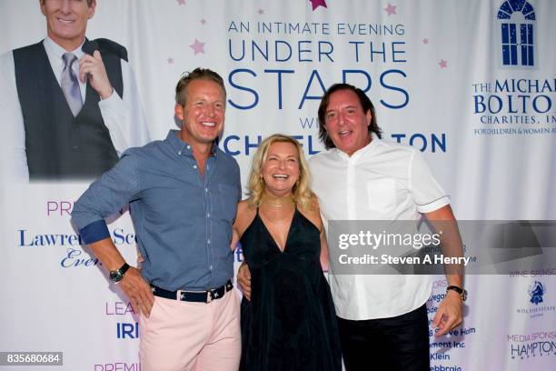 Chris Wragge, Debra Halpert and Lawrence Scott attend An Intimate Evening Under The Stars With Michael Bolton at Private Residence on August 19, 2017...