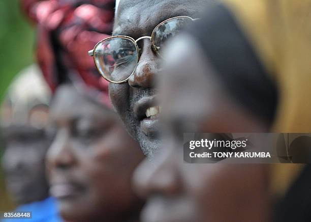 Malik Obama, half-brother of America's President elect Barack Obama, smiles on November 5, 2008 at his Kogelo village residence where he gave a press...