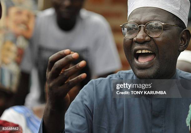 Malik Obama, half-brother of America's President elect, Barack Obama smiles November 05, 2008 at his Kogelo village residence where he gave a press...