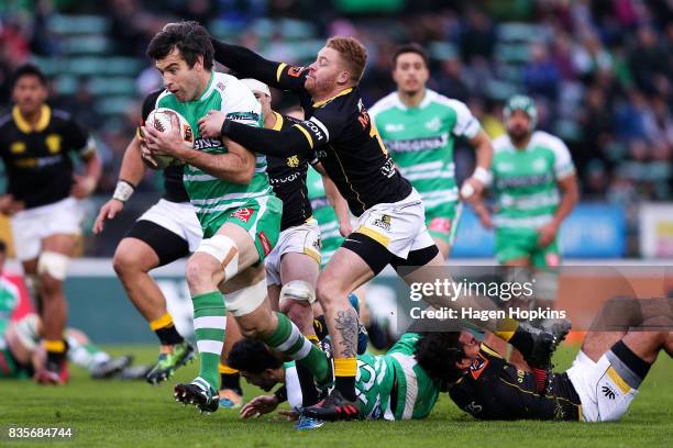 Nick Crosswell of Manawatu is tackled by Regan Verney of Wellington during the round one Mitre 10 Cup match between Manawatu and Wellington at...