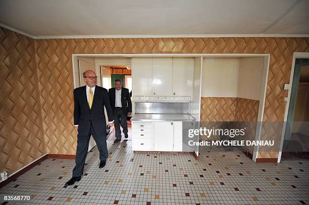 Swedish ambassador to France Gunnar Lund and Mayor of Colombelles Colin Sueur visit a Swedish house on November 3 in Colombelles, northern France....