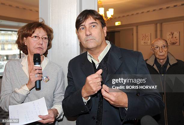 Swiss writer Alain Claude Sulzer poses next to head of the jury Anne Wiazemsky after receiving the "Prix Medicis etranger" for his book "Un garcon...