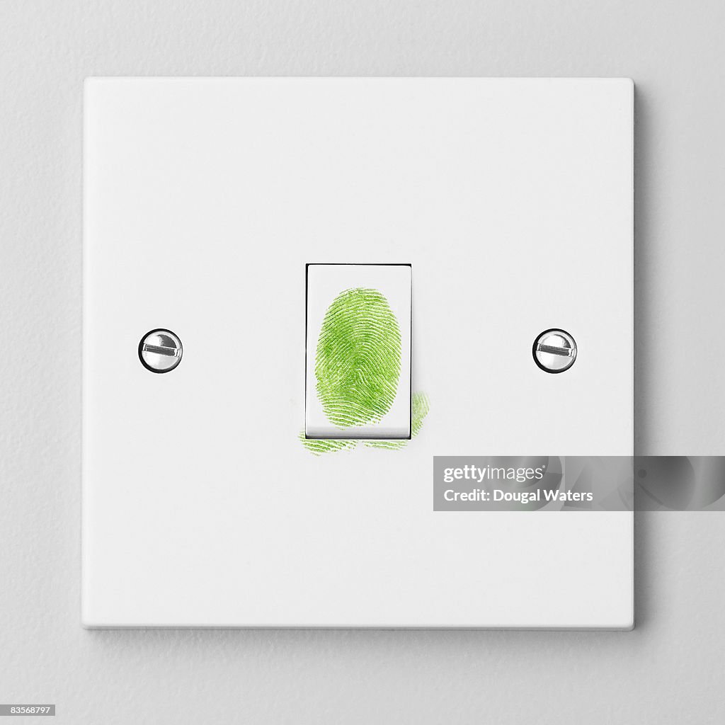 Green Fingerprint On Light Switch High-Res Stock Photo - Getty Images