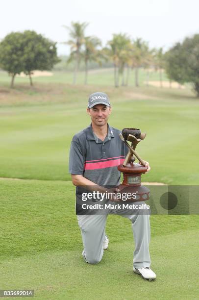 Jason Norris of Australia poses with his trophy after winning on day four of the 2017 Fiji International at Natadola Bay Championship Golf Course on...