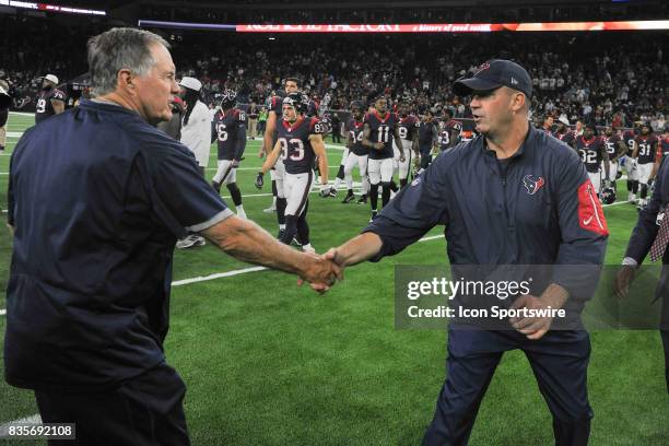 Houston Texans Head Coach Bill O'Brien and New England Patriots Head Coach Bill Belichick shake hands following the NFL preseason game between the...
